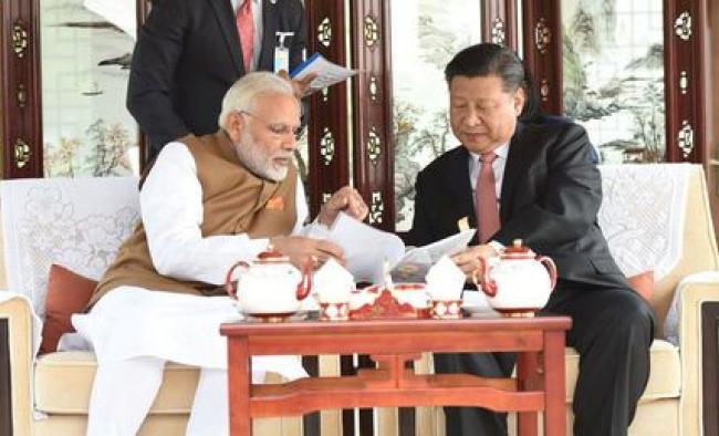 China’s Xi, India’s Modi Seek  New Relationship after Summit
